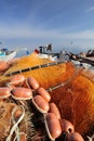 Red fishnet and fisherman tools Royalty Free Stock Photo