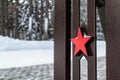 The red five-pointed metal star is a symbol of the Soviet Union and the Soviet Army, a close-up Soviet star Royalty Free Stock Photo