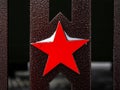 The red five-pointed metal star is a symbol of the Soviet Union and the Soviet Army, a close-up Soviet star Royalty Free Stock Photo