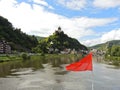 Red flag and Cochem town on Moselle river Royalty Free Stock Photo