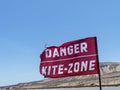 Red flag danger kite surfer zone. Royalty Free Stock Photo