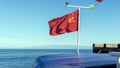 Red flag of the Soviet Union on the ship. Royalty Free Stock Photo