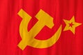 Red flag of the USSR with hammer and sickle and star. Close-up of textile embroidered banner. Background or backdrop Royalty Free Stock Photo