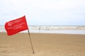 Red flag Warning Strong Current and Dangerous No Swimming in sea on Storm. Red flag flying on beach Royalty Free Stock Photo