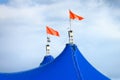 Red flags on top of circus tent Royalty Free Stock Photo
