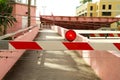 Red flashing barricade light in front of an open drawbridge Royalty Free Stock Photo