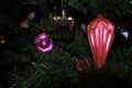 Red flashlight. vintage christmas toys on new year tree background. Royalty Free Stock Photo
