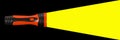 Red flashlight with yellow ray of light isolated on black background Royalty Free Stock Photo