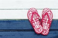Red flip flops on a blue and white wooden board Royalty Free Stock Photo