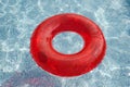 Red float floating in the pool Royalty Free Stock Photo
