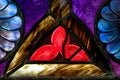 Red Flower Petals Depicted in Stained Glass Window