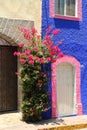 Colored house wall in the street of Tequisquiapan, Mexico.