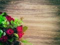 A red flower pot on a wooden table and has space Royalty Free Stock Photo