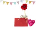 Red flower with red paper card with wooden pink heart and vintage party flag on white backgorund Royalty Free Stock Photo