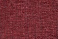 Red fluffy background of soft, fleecy cloth. Texture of textile closeup Royalty Free Stock Photo