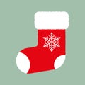 Red fluffy Christmas stocking with white snowflake on green background. Vector Christmas gift sock. Flat vector Illustration Royalty Free Stock Photo