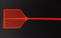 Red fly swatter isolated on a black background Royalty Free Stock Photo