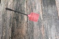 Red fly swatter. Single flyswatter made of plastic and unfailing