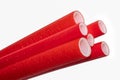 Red foam insulation for water pipes. Royalty Free Stock Photo