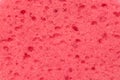 Red foam sponge. Background, texture. Royalty Free Stock Photo