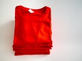 Red folded T-shirt stack Royalty Free Stock Photo