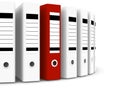 Red folder within white ones Royalty Free Stock Photo