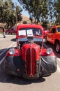 Red 1950 Ford Anglia Coupe