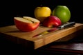 Red fresh apples, chopped up on the old board Royalty Free Stock Photo