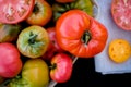 Big tomatoes harvest at table Royalty Free Stock Photo