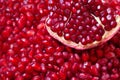 Red fresh piece of pomegranate closeup