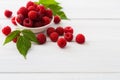 Red fresh raspberries on white rustic wood background Royalty Free Stock Photo