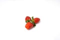 Red and fresh strawberries isolated on white Royalty Free Stock Photo