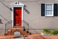 Red Front Door of a Traditional Wooden House Royalty Free Stock Photo