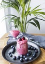 Red fruit detox smoothie. Smoothie full of vitamins and antioxidants. Healthy breakfast or snack. Vegetarian and vegan.
