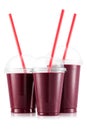 Red fruit smoothie in three size of pet cup Royalty Free Stock Photo