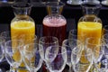 Red fruits and orange juice and crystal glasses