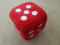 Red furry dice for children playing Royalty Free Stock Photo