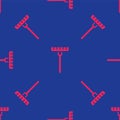 Red Garden rake icon isolated seamless pattern on blue background. Tool for horticulture, agriculture, farming. Ground Royalty Free Stock Photo