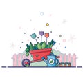 Red garden wheelbarrow with blue watering can. Around fence, plants, flowers, summer, dragonflies. Modern picture, artoon style Royalty Free Stock Photo