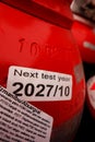 Red gas cylinders in warehouse storage Royalty Free Stock Photo