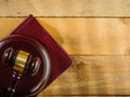 Red gavel of the judge on a wooden background. Low angle view. Constitution, justice, rule of law, judge, lawyer, constitution,