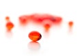 Red gel capsules. Selective focus. Royalty Free Stock Photo