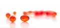 Red gel capsules. Selective focus. Royalty Free Stock Photo