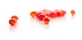 Red gel capsules. Selective focus. Royalty Free Stock Photo