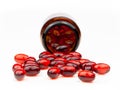 Red gel medical capsules, isolated on white background Royalty Free Stock Photo