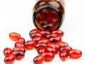 Red gel medical capsules, isolated on white background Royalty Free Stock Photo