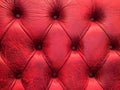 Red genuine leather upholstery texture