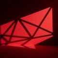 Red Geometric Light Art Installation with Sharp Lines Royalty Free Stock Photo