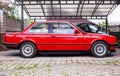 Red German retro car parked in the yard Royalty Free Stock Photo