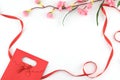 Red gift bag and ribbon decorated with fake pink flower Royalty Free Stock Photo